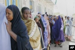 Women line up to cast their ballots in parliamentary elections in Hargeisa in Somaliland. (September 2005)