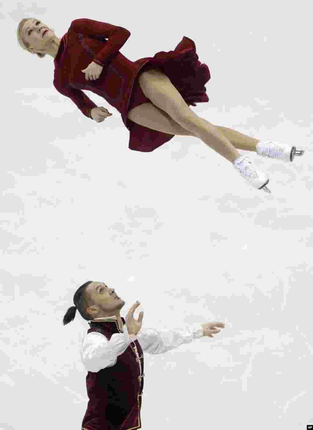 Tatiana Volosozhar and Maxim Trankov of Russia skate Pairs&rsquo; Free Program at the European figure skating championships in Bratislava, Slovakia, Jan. 30, 2016.