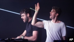 FILE - Andrew Taggart, right, and Alex Pall with the The Chainsmokers performs at the Bonnaroo Music and Arts Festival.