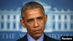 FILE - U.S. President Barack Obama delivers remarks at the White House.