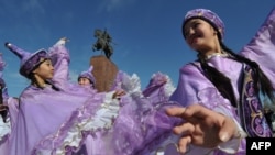 Kyrgyz women wearing traditional costumes perform during the celebrations of Nowruz (New Year) at the central Ala-Too Square in Bishkek on March 21, 2016. Nowruz, "The New Year" in Farsi, is an ancient festival marking the first day of spring in Central A