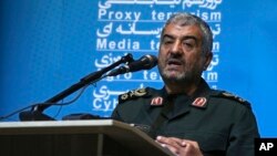 FILE - Mohammad Ali Jafari, the head of Iran's Islamic Revolutionary Guard Corps, delivers a speech in Tehran, Oct. 31, 2017.