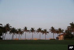 Palm trees line the lawn at Mar-a-Lago where President Donald Trump and Chinese President Xi Jinping are meeting in Palm Beach, Florida, April 6, 2017.