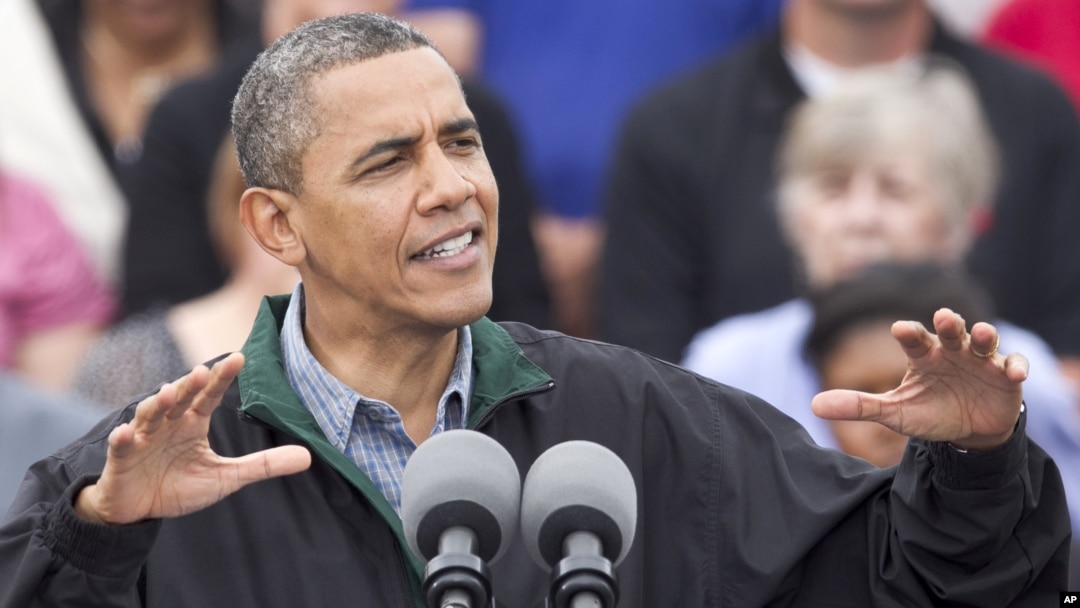 President Barack Obama speaks during a campaign stop in Council Bluffs, Iowa, August 13, 2012.