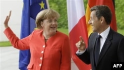 Merkel ve Sarkozy Krizi Çözmede Kararlı