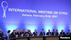 Participants of Syria peace talks attend a meeting in Astana, Kazakhstan, Feb. 16, 2017.