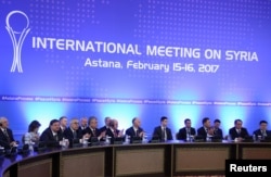 Participants of Syria peace talks attend a meeting in Astana, Kazakhstan, Feb. 16, 2017.