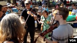 Musical performances were not limited to the half-dozen stages at the folk festival at Glen Echo Park.