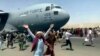 Kabul Airport in Chaos, Biden Defends US Withdrawal