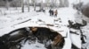 E. Ukraine Cease-fire Breach Traps Thousands of Civilians