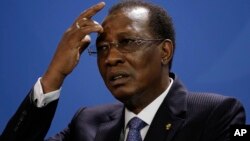 FILE - President Idriss Deby Itno attends a news conference with German Chancellor Angela Merkel after talks at the chancellery in Berlin, Oct. 12, 2016. 