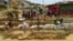 Rohingya refugees make a drainage canal in preparation for the upcoming monsoon season in Kutupalong refugee camp in Ukhia, Bangladesh, May 8, 2018.