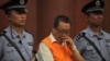 China Hukum 14 Tahun Pejabat 'Senyum' Terkait Korupsi