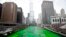 FILE - The Chicago River is dyed green during St. Patrick's Day celebrations in Chicago, March 15, 2014.
