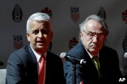 Sunil Gulati, left, President of the United States Soccer Federation, and Decio de Maria, President of the Mexican Football Federation, hold a news conference, April 10, 2017, in New York. The U.S., Mexico and Canada announced a joint bid for the 2026 event.