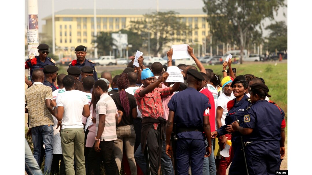 FILE - Congolese police detain protesters demanding that President Joseph Kabila leave power by the end of the year in Kinshasa, Democratic Republic of Congo, July 31, 2017.
