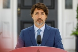 FILE - Canada's Prime Minister Justin Trudeau attends a news conference in Ottawa, July 13, 2020.