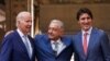 U.S. President Joe Biden, Mexican President Andres Manuel Lopez Obrador and Canadian Prime Minister Justin Trudeau pose at the conclusion of the North American Leaders' Summit in Mexico City, Mexico, Jan. 10, 2023. 