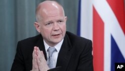 British Foreign Minister William Hague speaks during a press conference in Moscow, Russia, May 28, 2012.