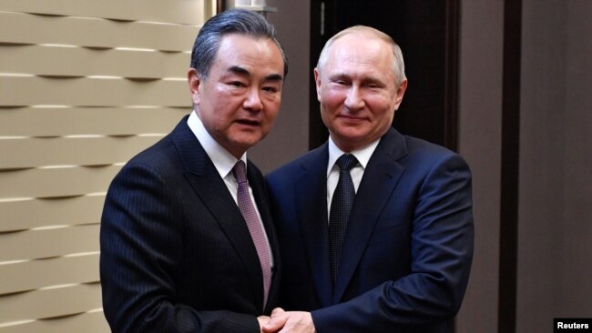 俄罗斯总统普京2019年5月13日在俄罗斯索契会见中国外长王毅。