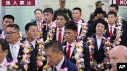 North Korean taekwondo demonstration team members arrive in South Korea for its first performances in the rival country in 10 years.