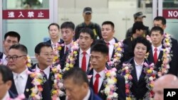 Anggota tim demonstrasi taekwondo Korea Utara tiba di Korea Selatan untuk pertunjukan pertamanya di negara saingannya tersebut dalam 10 tahun. 