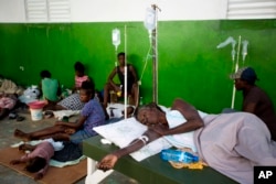 Victims of cholera receive treatment at a cholera center in Anse D'Hainault, Haiti, Oct. 11, 2016.