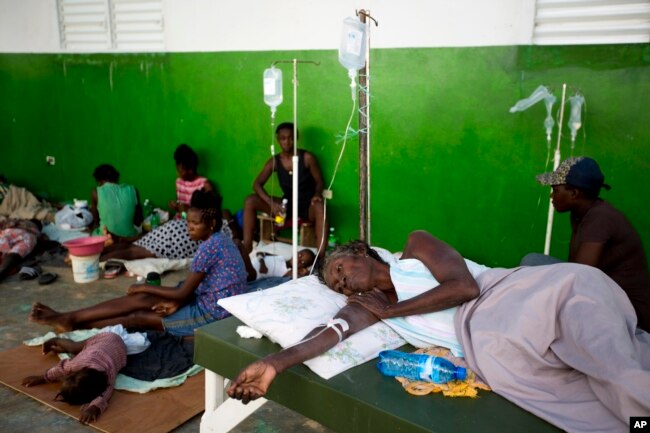 Victims of cholera receive treatment at a cholera center in Anse D'Hainault, Haiti, Oct. 11, 2016.