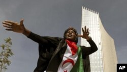 A traditional dancer performs during the inauguration of the new African Union headquaters in Ethiopia's capital Addis Ababa, January 28, 2012.