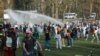 Polisi Bubarkan Kerumunan Besar di Taman Brussel untuk &#39;Konser Palsu&#39;