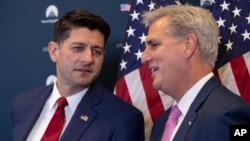Speaker of the House Paul Ryan, R-Wis., left, and Majority Leader Kevin McCarthy, R-Calif., confer during a news conference on a defense funding bill moving in the House, at the Capitol in Washington, Sept. 26, 2018.