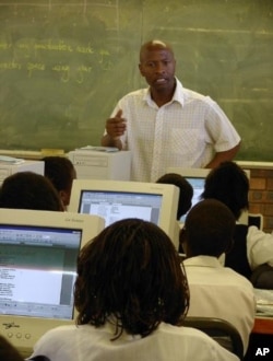 Students listen to ICT instruction at KwaMhlanga High School in Mpumalanga, South Africa.