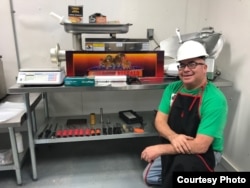 Photo shows Charles "Bamm" Brewer, Oglala Lakota, who heads up the Charging Buffalo Meat House on the Pine Ridge Indian Reservation in South Dakota. Brewer is on a mission to help Lakota return to a more traditional--and healthy--diet. Courtesy: One Spir
