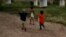 Enfants à Matamoros, dans l'État de Tamaulipas, au Mexique, le 26 juin 2019. (AP)