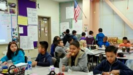 Students eating breakfast in class