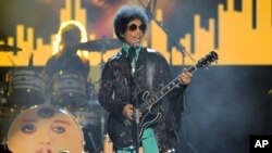 FILE - Prince performs at the Billboard Music Awards at the MGM Grand Garden Arena in Las Vegas. 