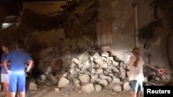 People view damage after an earthquake hit the island of Ischia, off the coast of Naples, Italy, Aug. 21, 2017. (Massimo Bottiglieri/Handout via Reuters)