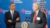 President Barack Obama is introduced by W. James McNerney, Jr., CEO of Boeing (R), before speaking to members of the Business Roundtable, a trade group representing America's big businesses, in Washington, Sept. 18, 2013.