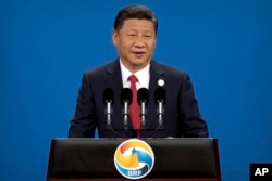 Chinese President Xi Jinping speaks during the opening ceremony of the Belt and Road Forum at the China National Convention Center in Beijing, May 14, 2017. Xi offered tens of billions of dollars for projects that are part of his signature foreign policy initiative linking China to much of Asia, Europe and Africa.