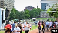 People walk along the Independence Hall, the historic place in Philadelphia, Pennsylvania. July, 27 2016.