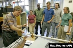 Engineering professor E. Carr Everbach, explains an experiment to a class at Swarthmore College in Swarthmore, Pennsylvania. Swarthmore College is one of an increasing number of colleges traditionally known for the humanities English, history, philosophy