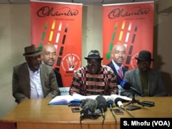 Tendai Biti of the Movement for Democratic Change (MDC) Alliance, speak to reporters in Harare, July 12, 2018.