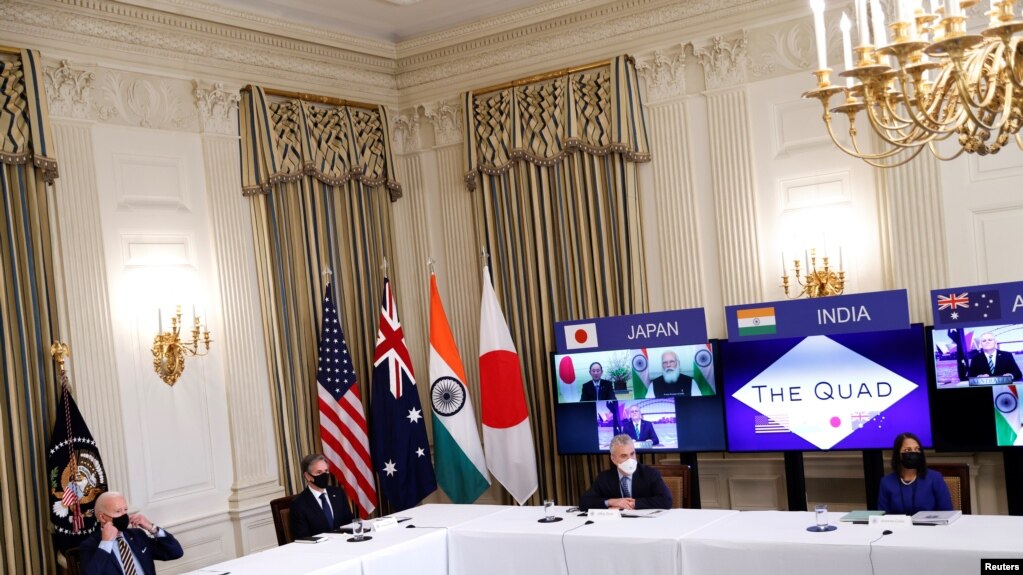 美国与日本、澳大利亚和印度领导人2021年3月12日举行视讯四方峰会（路透社） (photo:VOA)