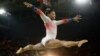 United States' Simone Biles performs on the balance beam during the gymnastics exhibition gala at the 2016 Summer Olympics in Rio de Janeiro, Brazil, Aug. 17, 2016.