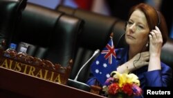 Australia's Prime Minister Julia Gillard at the start of a plenary session on the second day of the ASEM Summit in Vientiane, Laos, November 6, 2012