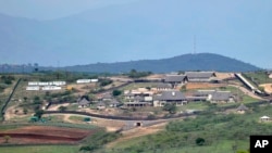 FILE - A Sept. 28, 2012, photo shows the private compound homestead of South African President Jacob Zuma in Nkandla, in the northern KwaZulu Natal province, South Africa.