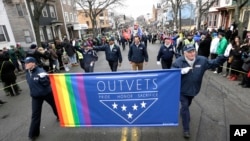 FILE - Members of OutVets, a group of gay military veterans, marches in Boston's St. Patrick's Day parade on March 15, 2015. U.S. President Joe Biden announced on June 26, 2024, that he is pardoning military veterans who were convicted for having consensual gay sex.