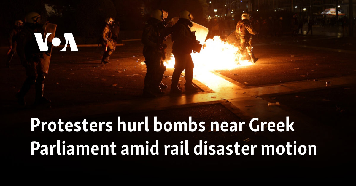 Protesters hurl bombs near Greek Parliament amid rail disaster motion debate