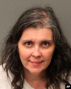 This Jan. 18, 2018, photo provided by Riverside County Sheriff's Department shows Louise Anna Turpin.