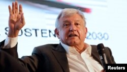 Leftist front-runner Andres Manuel Lopez Obrador of the National Regeneration Movement (MORENA) addresses the audience during a conference organized by the Mexican Construction Industry Association in Guadalajara, Mexico March 23, 2018. 